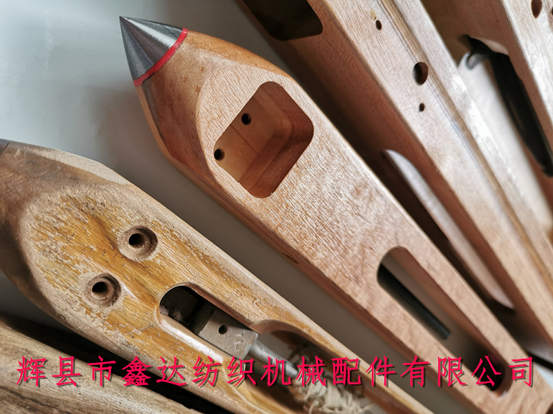 Comparison of Handmade Wood Shuttle Materials in Textile Equipment Images