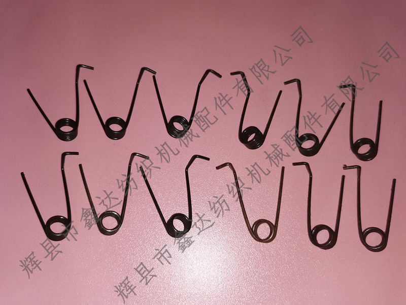 Torsion spring of waste edge scissors of rapier machine